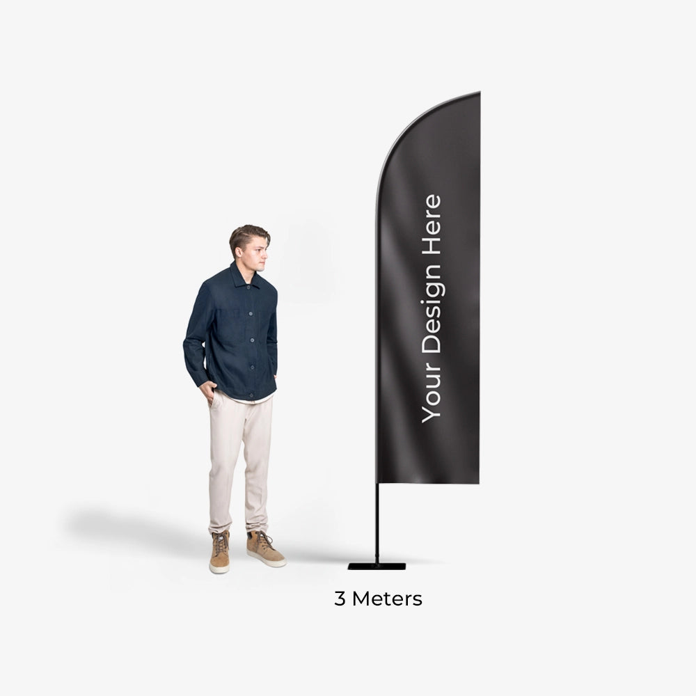 Black feather flag with space for design next to a standing person on a white background