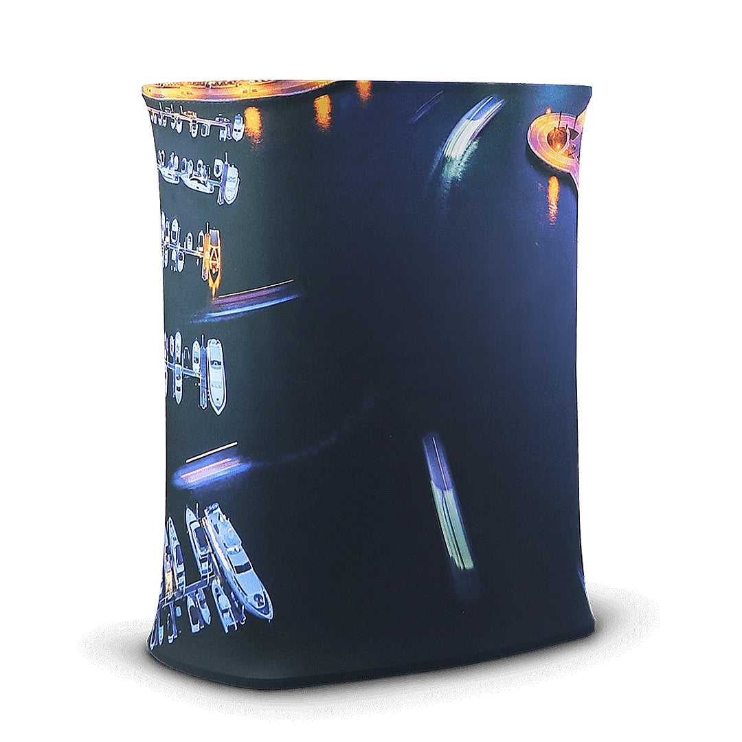 A fabric counter rectangular in shape with a printed design featuring what appears to be musical instruments and nightlife imagery.