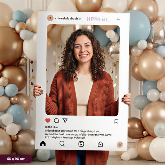Woman holding a framed photo with balloons and HP Print branding