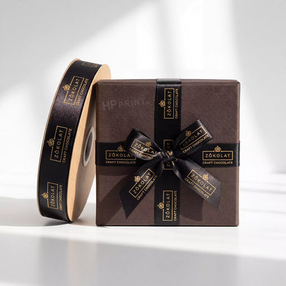Zökolat chocolate box with branded ribbon on a white background