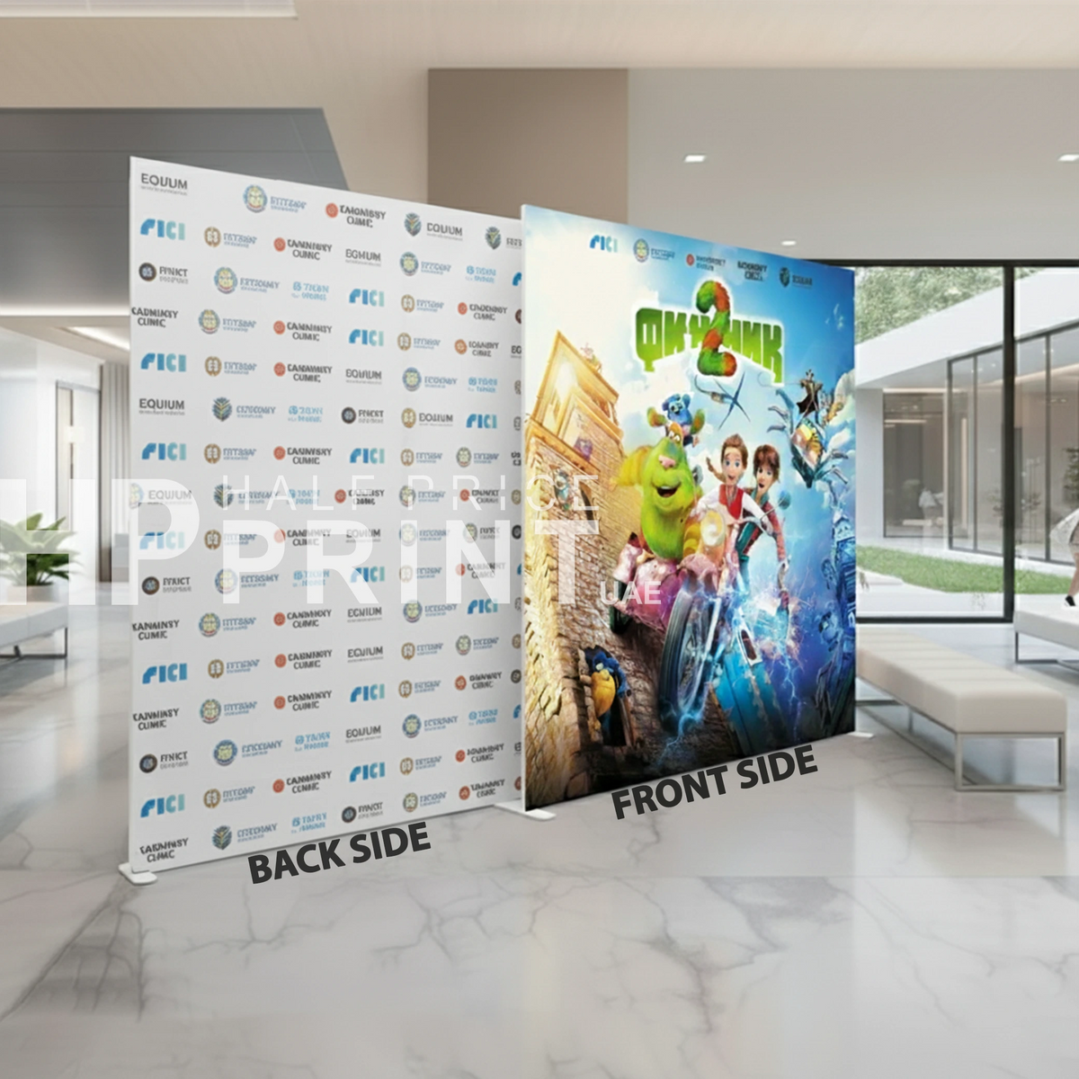 Promotional display with 'Shrek' movie poster on one side and branded backdrop on the other in a modern indoor setting.