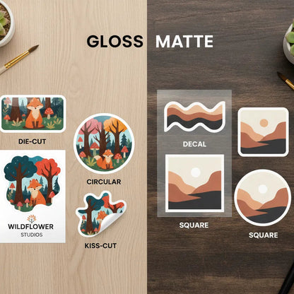 Comparison of gloss and matte finishes on Wildflower Studios stickers on a wooden surface.
