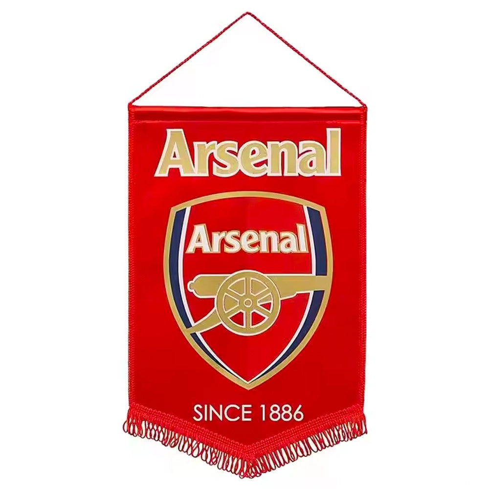 Red Arsenal FC pennant flag featuring the club crest with cannon emblem and ‘Since 1886’ text, finished with a hanging cord and tasselled bottom edge.